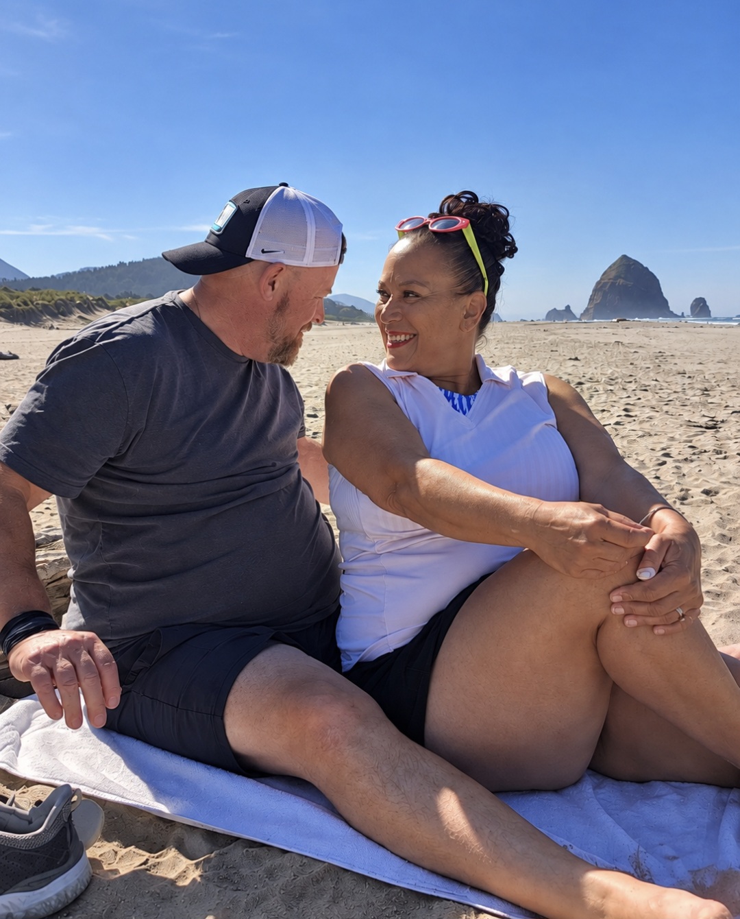 Evee B sharing a playful look with her husband Zig at the beach